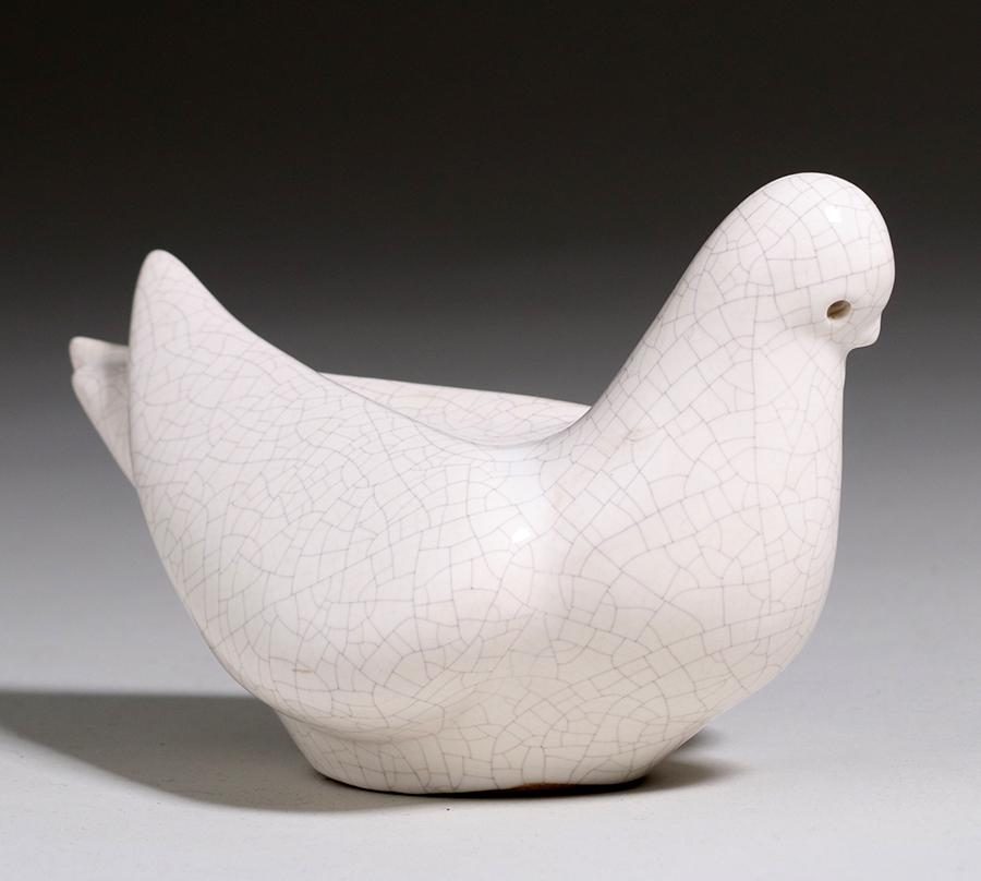 James Lovera White Ceramic Dove: James Lovera white ceramic dove. Signed. Perfect condition. 9.75" x 5.25" x 5.5"h. Spend $5000 or more at this auction and all of your SHIPPING IS FREE within the lower 48 states.SHIPPING<