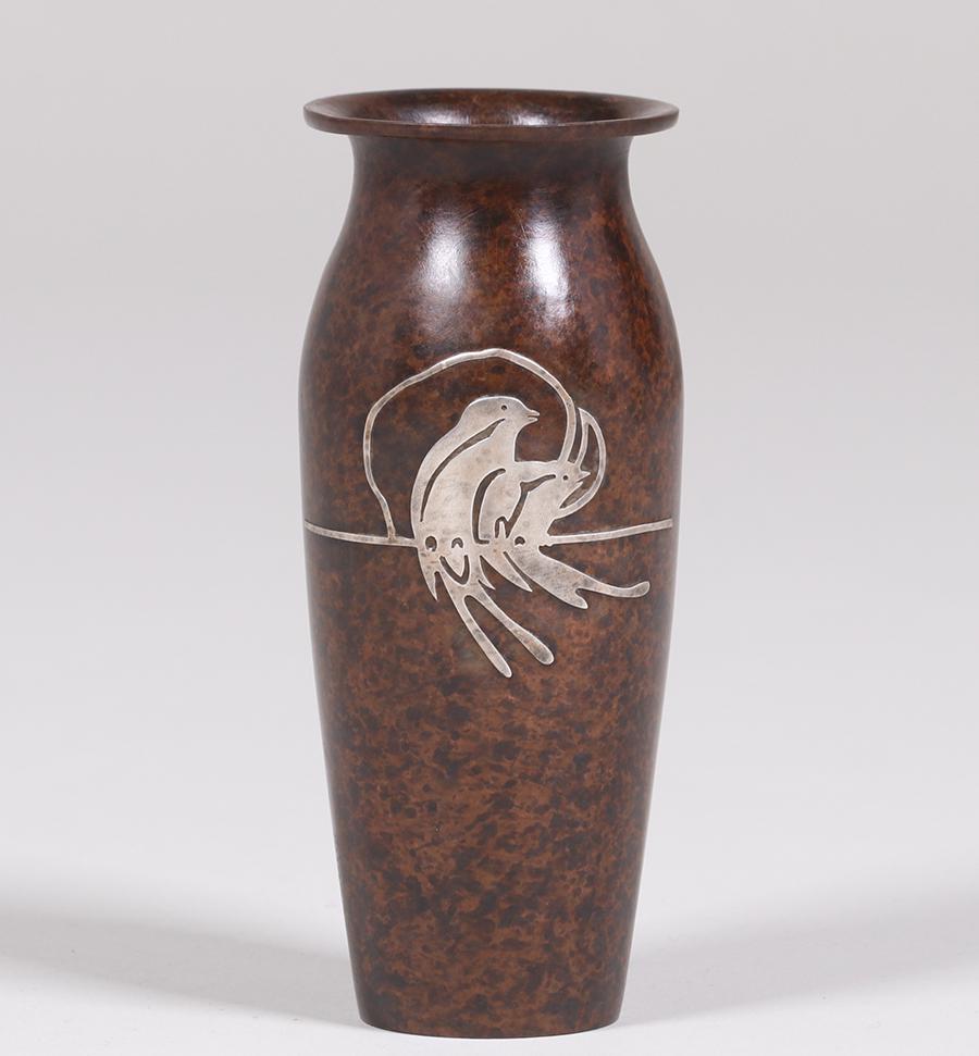 Small Silvercrest Parrot Overlay Vase c1920: Small Silvercrest sterling on bronze parrot overlay vase c1920. Signed. Excellent new patina. 6"h x 2.25"d. Spend $5000 or more at this auction and all of your SHIPPING IS FREE within the lower 48 sta