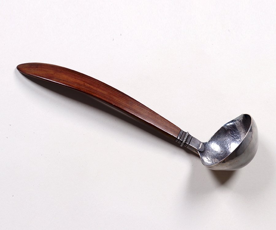 William Spratling Sterling & Rosewood Ladle c1940-1944: William Spratling Sterling & Rosewood Ladle c1940-1944. Signed. Excellent condition. 12.25"h x 3.5"w. Spend $5000 or more at this auction and all of your SHIPPING IS FREE within the lower 48 states. S