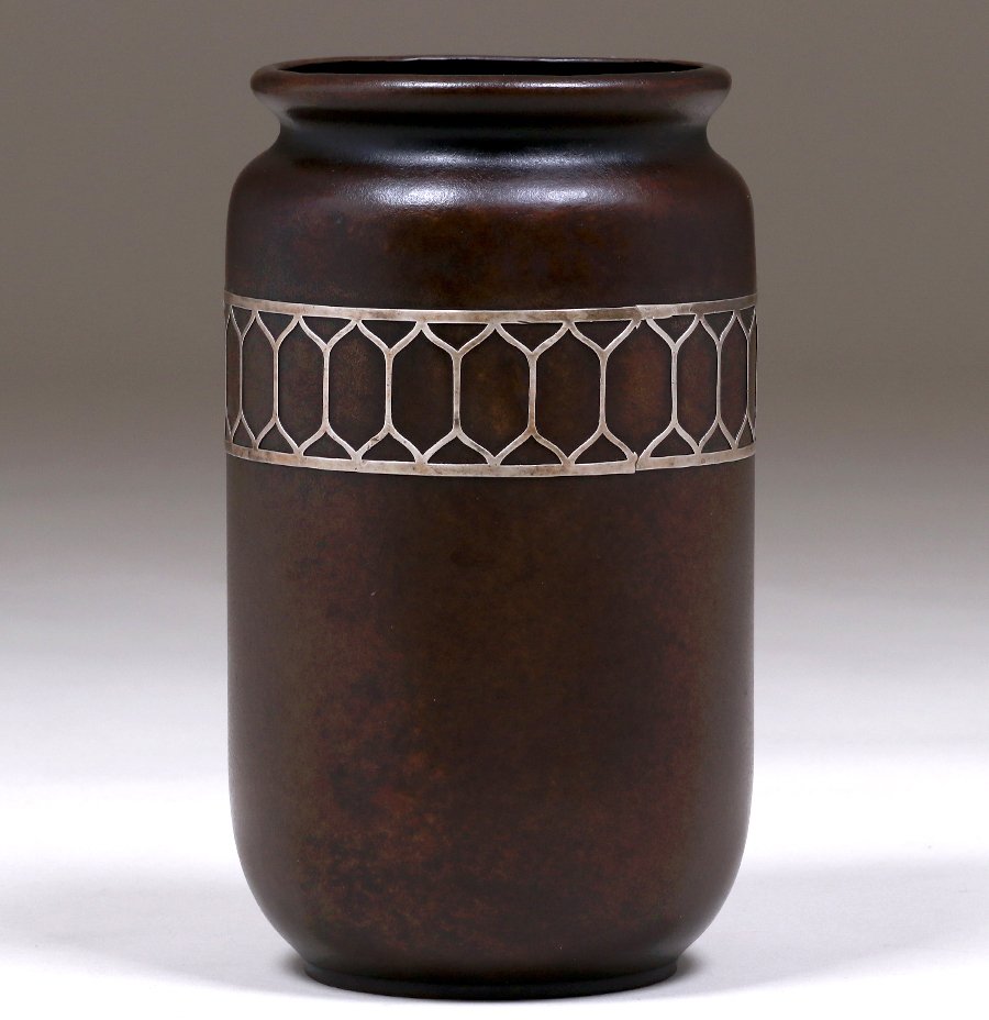 Silvercrest Sterling on Bronze Vase c1921: Silvercrest Sterling on Bronze Vase c1921. Signed. Excellent new patina. 8.75"h x 4.75"d. Spend $5000 or more at this auction and all of your SHIPPING IS FREE within the lower 48 states. SHIPPING We b