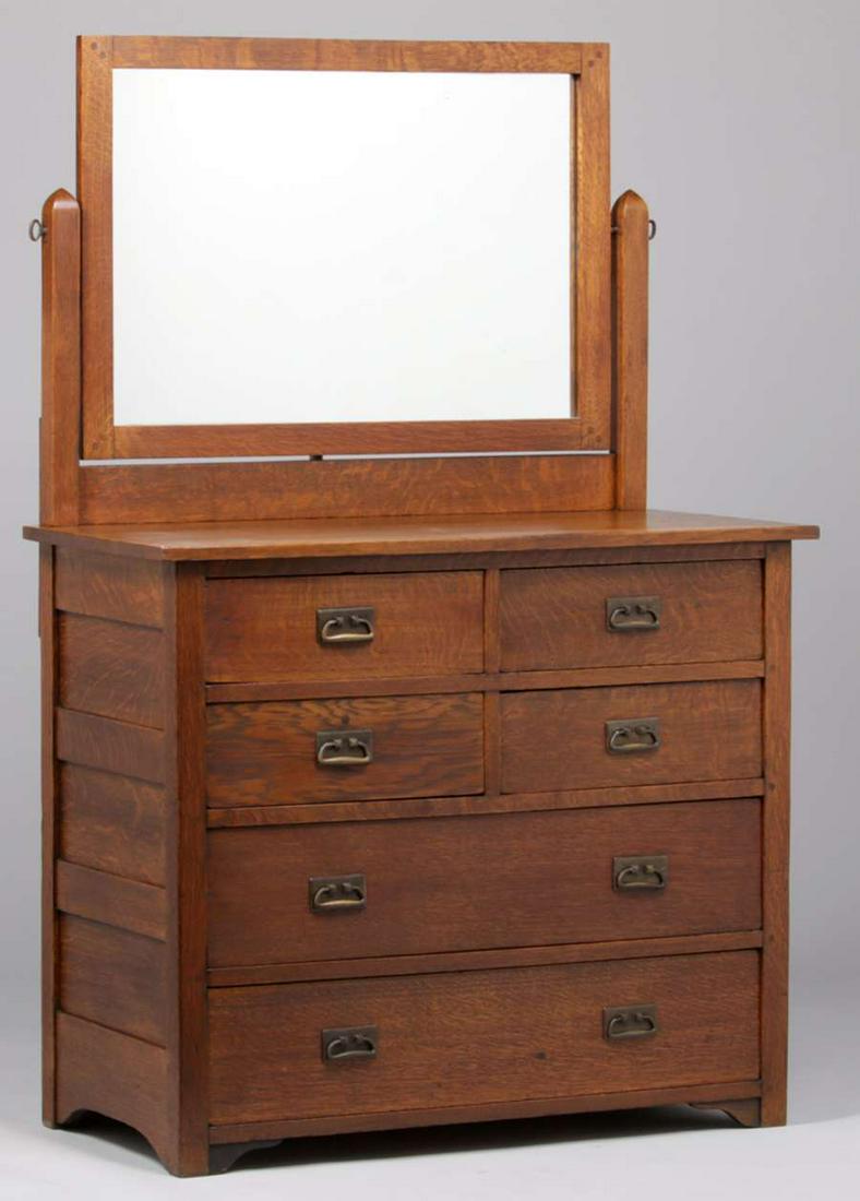 L&JG Stickley Onondaga Six-Drawer Dresser c1902-1904: L&JG Stickley Onondaga Six-Drawer Dresser c1902-1904. Unsigned. Nice old refinish. Very sturdy. 64.5"h x 42"w x 21"d. Spend $5000 or more at this auction and all of your SHIPPING IS FREE within the lo