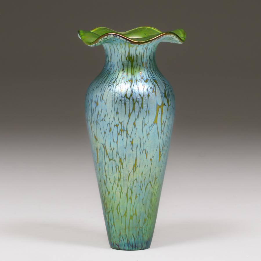 Loetz Art Glass Vase c1910s: Loetz Art Glass Vase c1910s. Unsigned. Perfect condition. 7.25"h x 3.5"d. Spend $5000 or more at this auction and all of your SHIPPING IS FREE within the lower 48 states. SHIPPING We box and ship ours