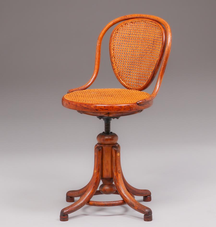 Thonet Swivel Chair c1905: Thonet Swivel Chair c1905. Signed. Excellent original finish. 32"h x 15.5"w x 17"d. Spend $5000 or more at this auction and all of your SHIPPING IS FREE within the lower 48 states. SHIPPING We box and