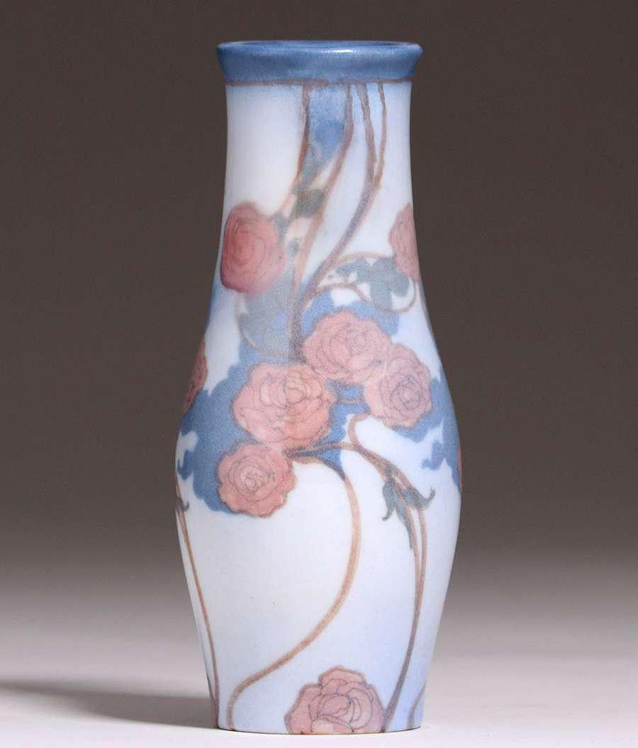 Rookwood Jeweled Porcelain Vase Fred Rothenbusch 1924: Rookwood Jeweled Porcelain Vase decorated by Frederick Rothenbusch dated 1924. Perfect condition. 7 1/8"h x 3"d. Spend $5000 or more at this auction and all of your SHIPPING IS FREE within the lower 4