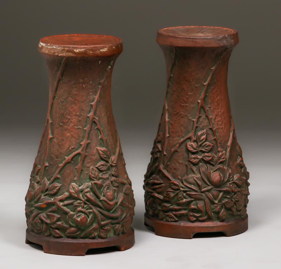 Pair Peters & Reed Moss Aztec Pedestals c1920: Pair Peters & Reed Moss Aztec Pedestals c1920. Several small edge chips. 17" h x 9"d base x 6.75"d. Spend $5000 or more at this auction and all of your SHIPPING IS FREE within the lower 48 states. SHI