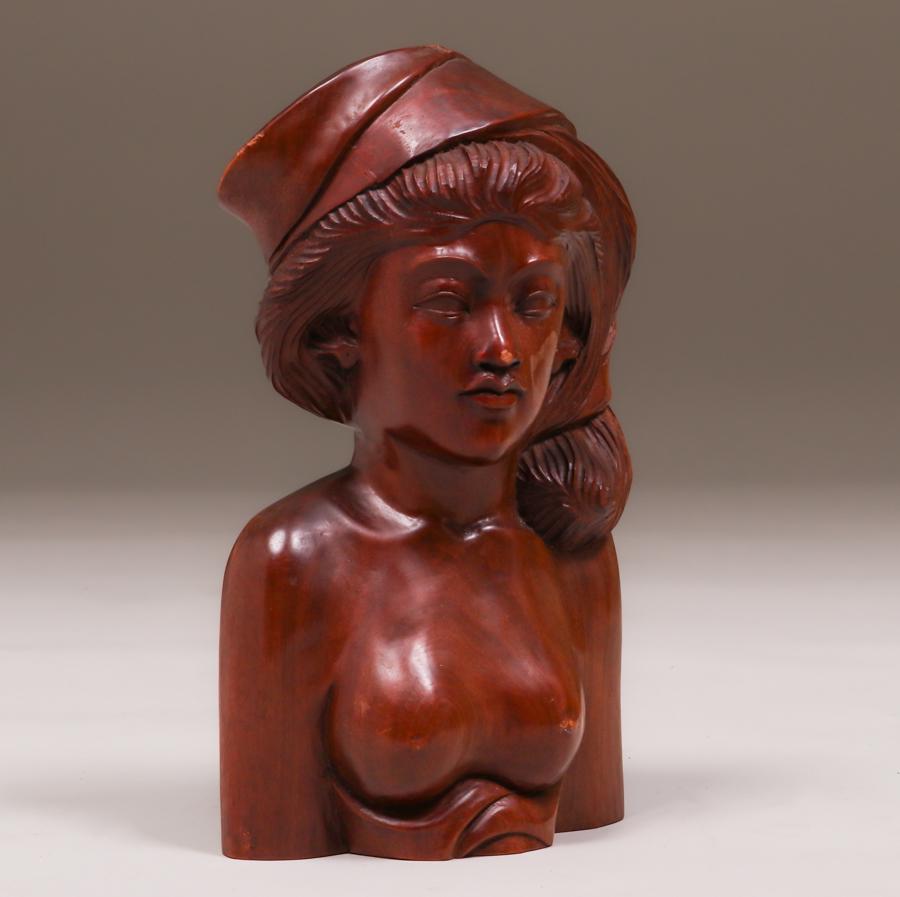 Hand-Carved Indonesian Figure: Hand-Carved Indonesian Figure. Signed. Excellent condition. 12.75"h x 7" x 4". Spend $5000 or more at this auction and all of your SHIPPING IS FREE within the lower 48 states. SHIPPING We box and ship