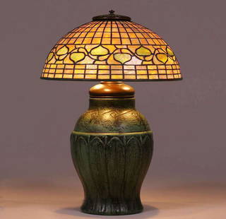 Tiffany Studios Leaded Glass Acorn Lamp Wheatley: Tiffany Studios Leaded Glass Acorn Lamp Wheatley Pottery Matte Green Base c1910. Shade signed "Tiffany Studios New York". Wheatley based has glazed over impressed WP mark. 19"h x 14"d. Spend $5000 or