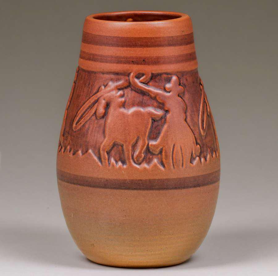 North Dakota School of Mines Julia Mattson #75 Cowboy: North Dakota School of Mines Julia Mattson #75 Cowboy Vase c1930s. Signed. A couple of glaze bubbles, otherwise perfect condition. 7 1/8"h x 4.25"d. Spend $5000 or more at this auction and all of your