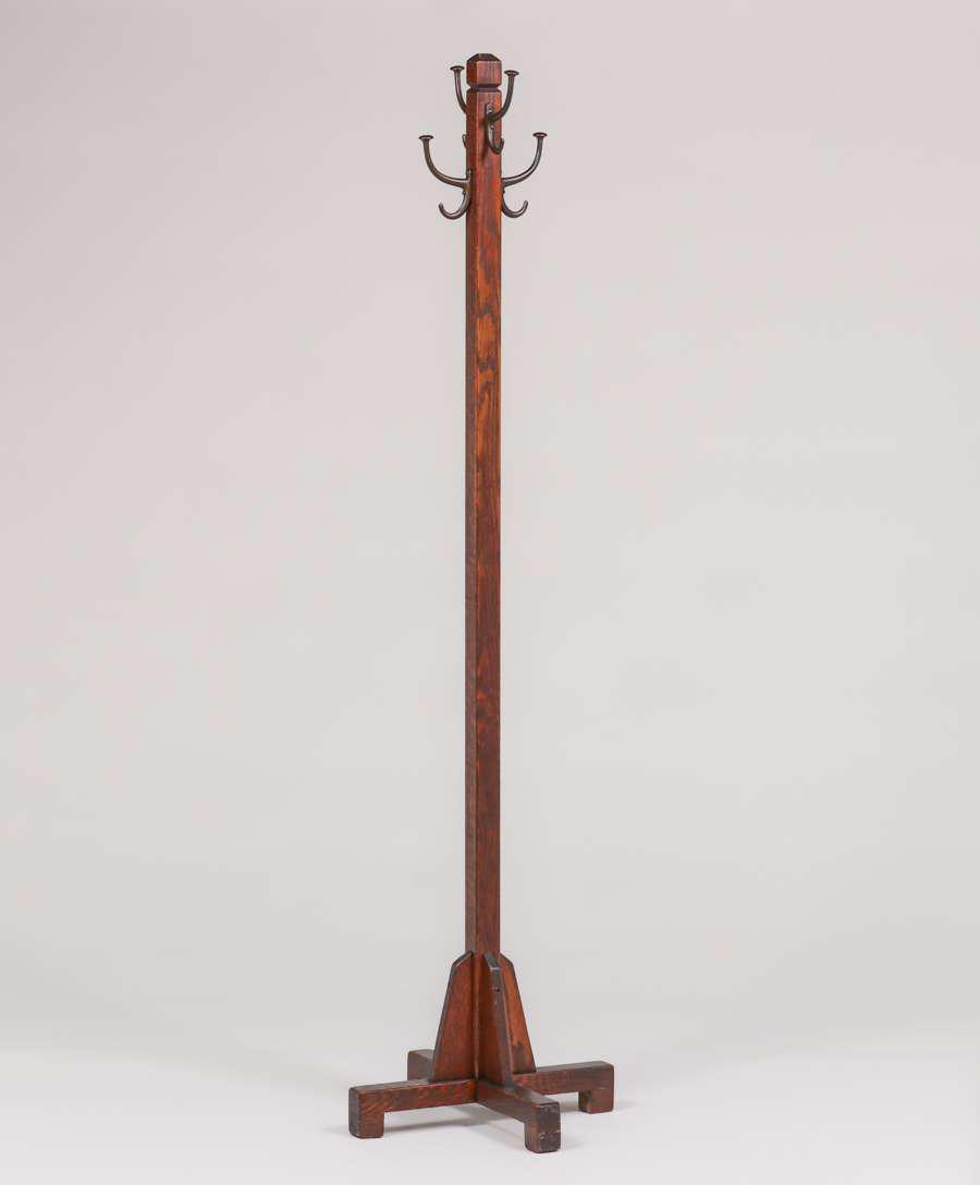 H.T. Cushman - Bennington, VT Oak Coatrack c1910: H.T. Cushman - Bennington, VT Oak Coatrack c1910. Signed. Excellent original finish. 66.75"h x 18" x 18". Spend $5000 or more at this auction and all of your SHIPPING IS FREE within the lower 48 state
