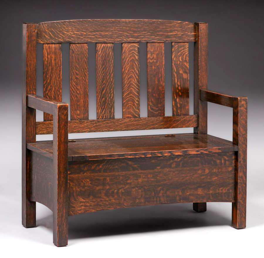 Limbert #92 Sift-Seat Hall Bench c1910: Limbert #92 Sift-Seat Hall Bench c1910. Signed with branded mark. Excellent original finish. 42”h x 42”w x 18”d. Spend $5000 or more at this auction and all of your SHIPPING IS FREE