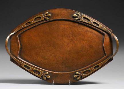 WMF German Hammered Copper & Brass Oval Serving Tray c1905: WMF German Hammered Copper & Brass Oval Serving Tray c1905. Unsigned. Excellent new patina. 17.75" x 12". Spend $5000 or more at this auction and all of your SHIPPING IS FREE within the lower 48 state