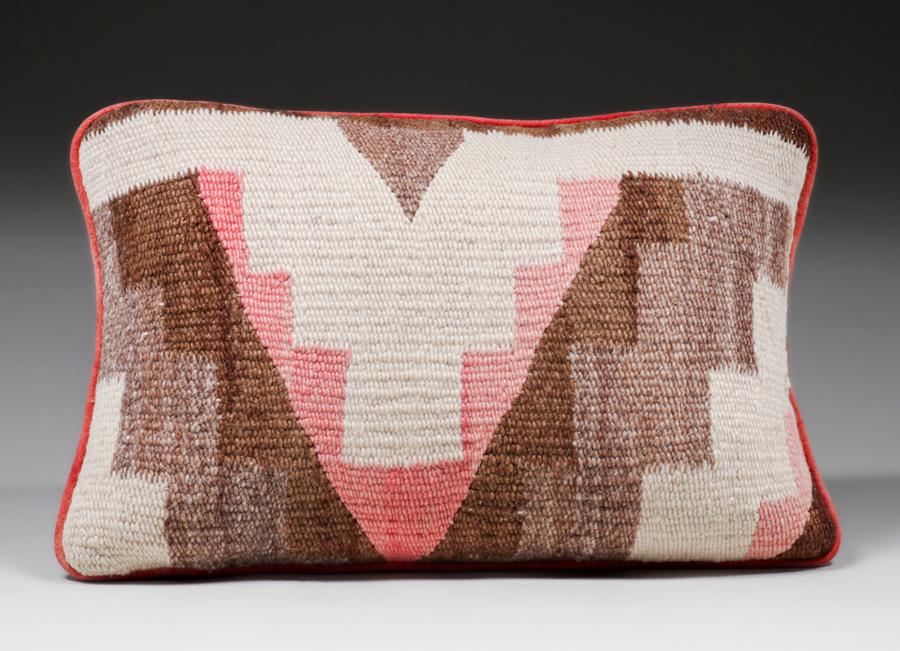 Navajo Rug Remnant Pillow c1910s: Navajo Rug Remnant Pillow c1910s. Slightly faded, otherwise excellent condition. 17w x 11h. Spend $5000 or more at this auction and all of your SHIPPING IS FREE within the lower 48 states. SHIPPING We