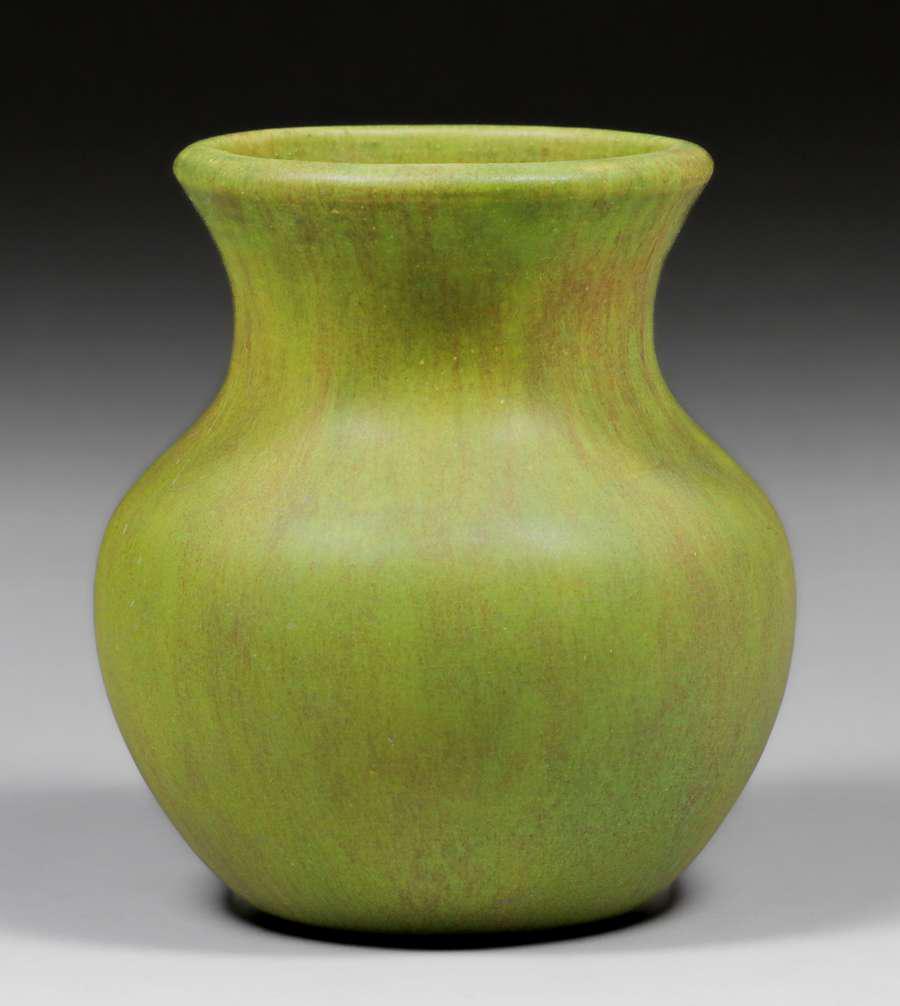 Roseville Early Carnelian Matte Green Vase after 1916: Roseville Early Carnelian Matte Green Vase after 1916. Unsigned. Perfect condition. 5.75h x 4.75d. Spend $5000 or more at this auction and all of your SHIPPING IS FREE within the lower 48 states. SHIP