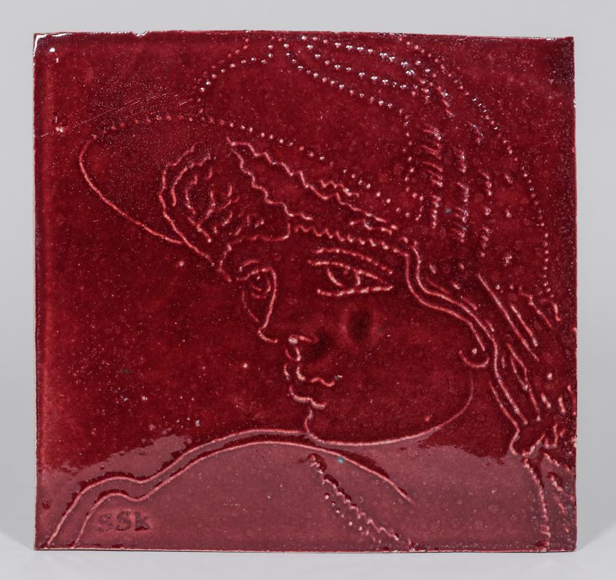 Large SSK Tile of Woman's Profile c1910s: Large SSK Tile of Woman's Profile c1910s. Signed SSK. Glazed over chips. Perfect condition. 11.5h x 12w inches. Spend $5000 or more at this auction and all of your SHIPPING IS FREE within the lower 48