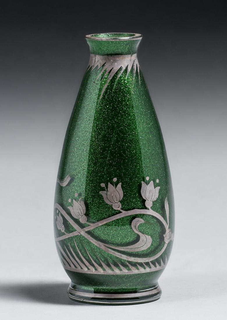 Art Nouveau Silver Overlay Glass Vase c1900s: Art Nouveau Silver Overlay Glass Vase c1900s. Unsigned. Some light wear to silver and top edge appears to have been ground down. 5.25"h x 2.25"d. Spend $5000 or more at this auction and all of your SH