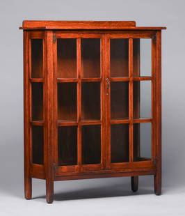 Stickley Brothers Two-Door China Cabinet c1910: Stickley Brothers Two-Door China Cabinet c1910. Signed. Excellent original finish. 53.5"h x 43.25"w x 15.5"d. Spend $7500 or more at this auction and all of your SHIPPING IS FREE within the lower 48 s