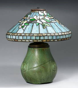 Hampshire Pottery Leaded Glass Lamp c1910: Hampshire Pottery Leaded Glass Lamp c1910. Signed. Spider lines to base otherwise perfect condition. Period shade has a few spider lines in shade. 22.5"h x 16"d Spend $7500 or more at this auction and