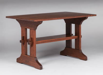 Gustav Stickley Oak Trestle Table c1910: Gustav Stickley Oak Trestle Table c1910. Signed with red decal. Excellent original finish. 48"w x 29.5"d x 29"h. Spend $7500 or more at this auction and all of your SHIPPING IS FREE within the lower 4