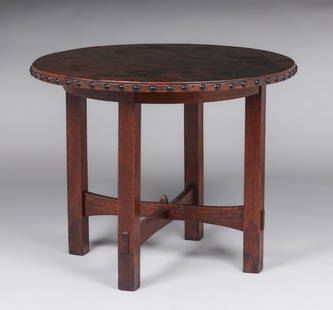 Gustav Stickley Leather-Top Lamp Table c1904: Gustav Stickley Leather-Top Lamp Table c1904. Signed. Excellent original finish and original leather. 36"d x 29"h. Spend $7500 or more at this auction and all of your SHIPPING IS FREE within the lower