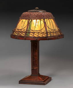 Gustav Stickley Oak & Wicker Table Lamp c1910: Gustav Stickley Oak & Wicker Table Lamp c1910. Unsigned. Silk liner slightly torn and wicker shadew with a few breaks. Excellent original finish. 18"h x 13"d. Spend $7500 or more at this auction and a