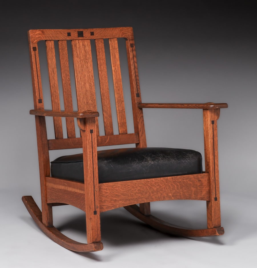 Limbert Ebon-Oak Rocker c1912: Limbert Ebon-Oak Rocker c1912. Signed with branded mark. Original finish. Rockers old but not original to rocker. 33.5"h x 26.5"w x 31"d. Spend $7500 or more at this auction and all of your SHIPPING I