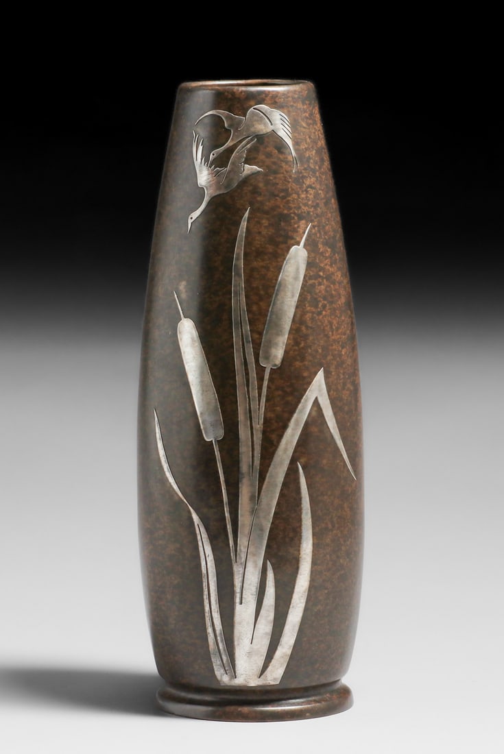 Silvercrest #1051 Swans & Cattails Sterling on Bronze Overlay Vase c1920: Silvercrest #1051 Swans & Cattails Sterling on Bronze Overlay Vase c1920. Signed. Professionally plugged drilled hole. Excellent new patina. 13"h x 4"d. Spend $7500 or more at this auction and all of