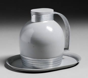 Henry Dreyfuss Thermos & Tray c1930s: Henry Dreyfuss Thermos & Tray c1930s. Manufactered by The American Thermos Bottle Co model 1549. Signed. Excellent condition. Tray 10 3/8" x 7.75". Thermos 7.25"h x 6.5"w x 6"d. Spend $7500 or more at