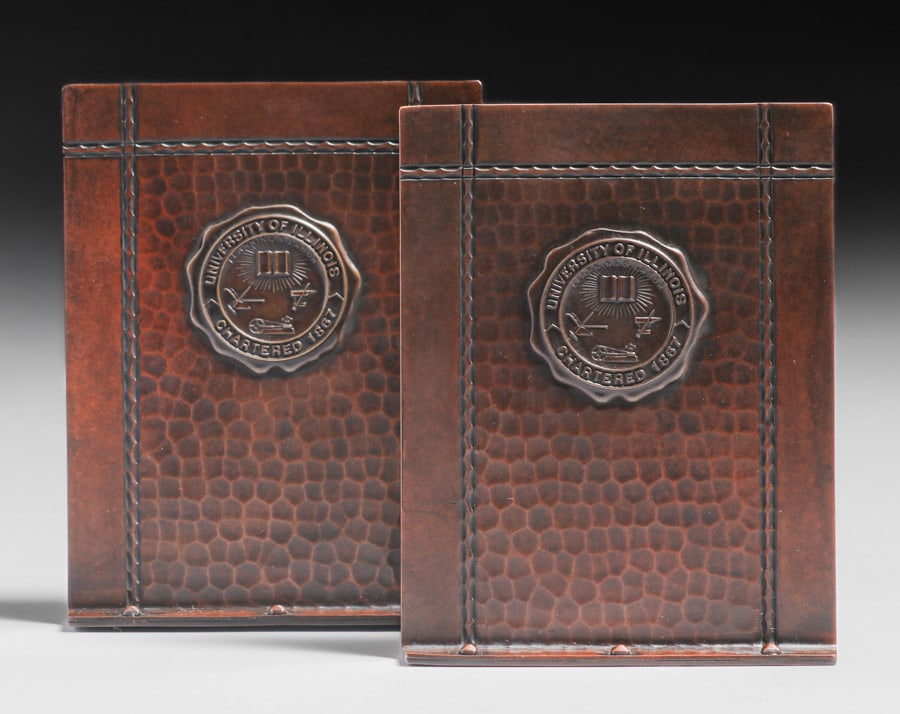 Roycroft University of Illinois Hammered Copper Bookends c1920s: Roycroft University of Illinois Hammered Copper Bookends c1920s. Signed. Color added to original patina. 5"h x 4"w. Spend $7500 or more at our two day auction and all of your SHIPPING IS FREE within t