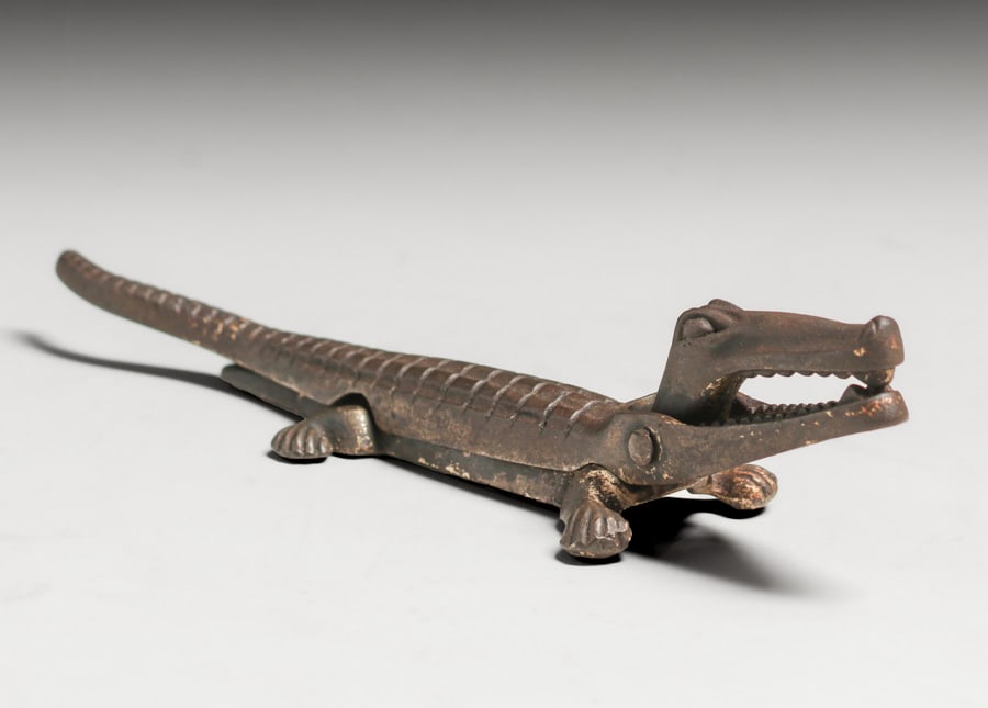 Nestor Cast Iron Crocodile Nut Cracker c1900s: Nestor Cast Iron Crocodile Nut Cracker c1900s. Signed. Excellent original patina. 8.75" x 2"w x 2.25"h. Spend $7500 or more at our two day auction and all of your SHIPPING IS FREE within the lower 48 