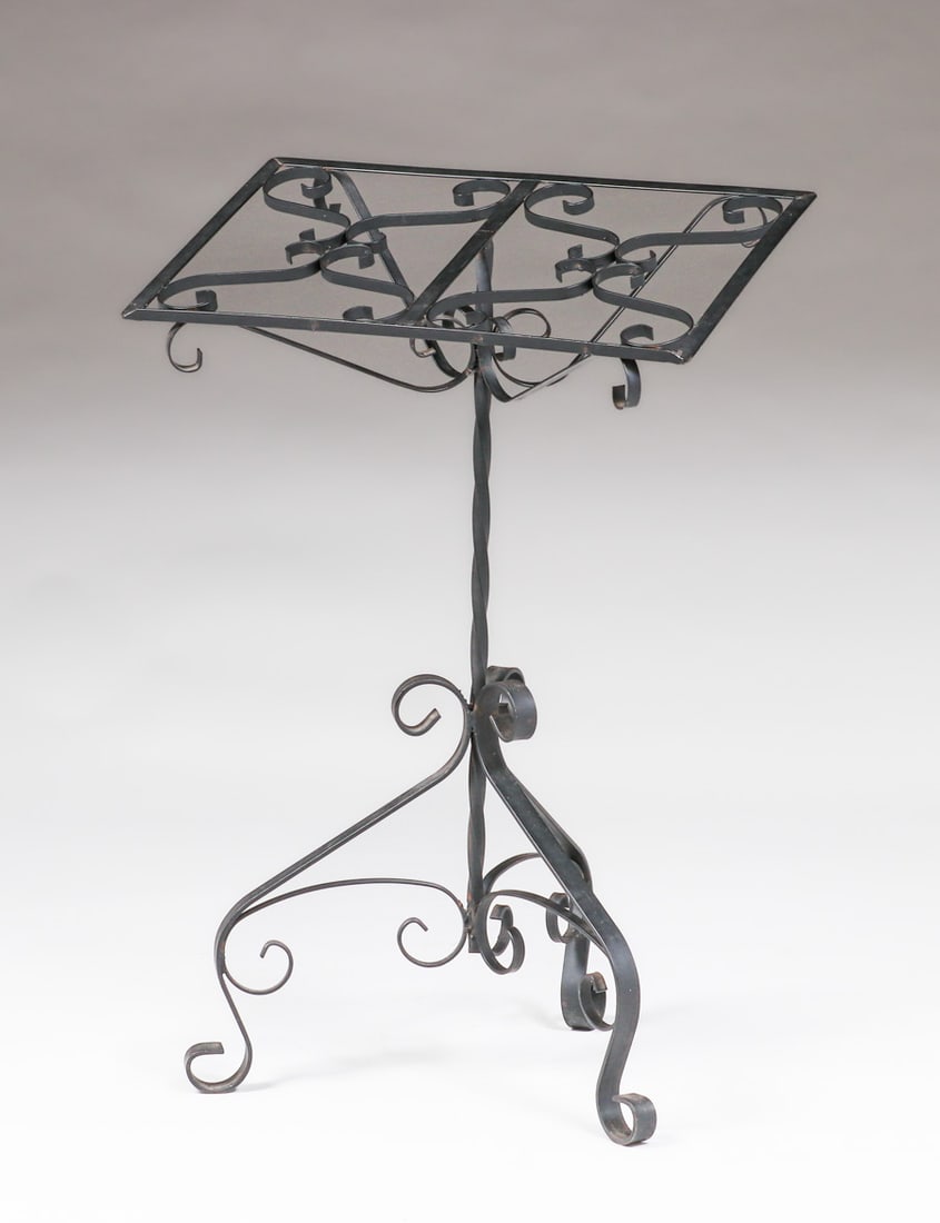 Wrought Iron Sheet Music Stand c1920s: Spanish Revial Iron Sheet Music Stand c1920s. Unsigned. Excellent original patina. 34.75"h x 22.75"w x 14". FREE NATIONWIDE SHIPPING for all of your purchases at our Two Day Auction within the lower 4