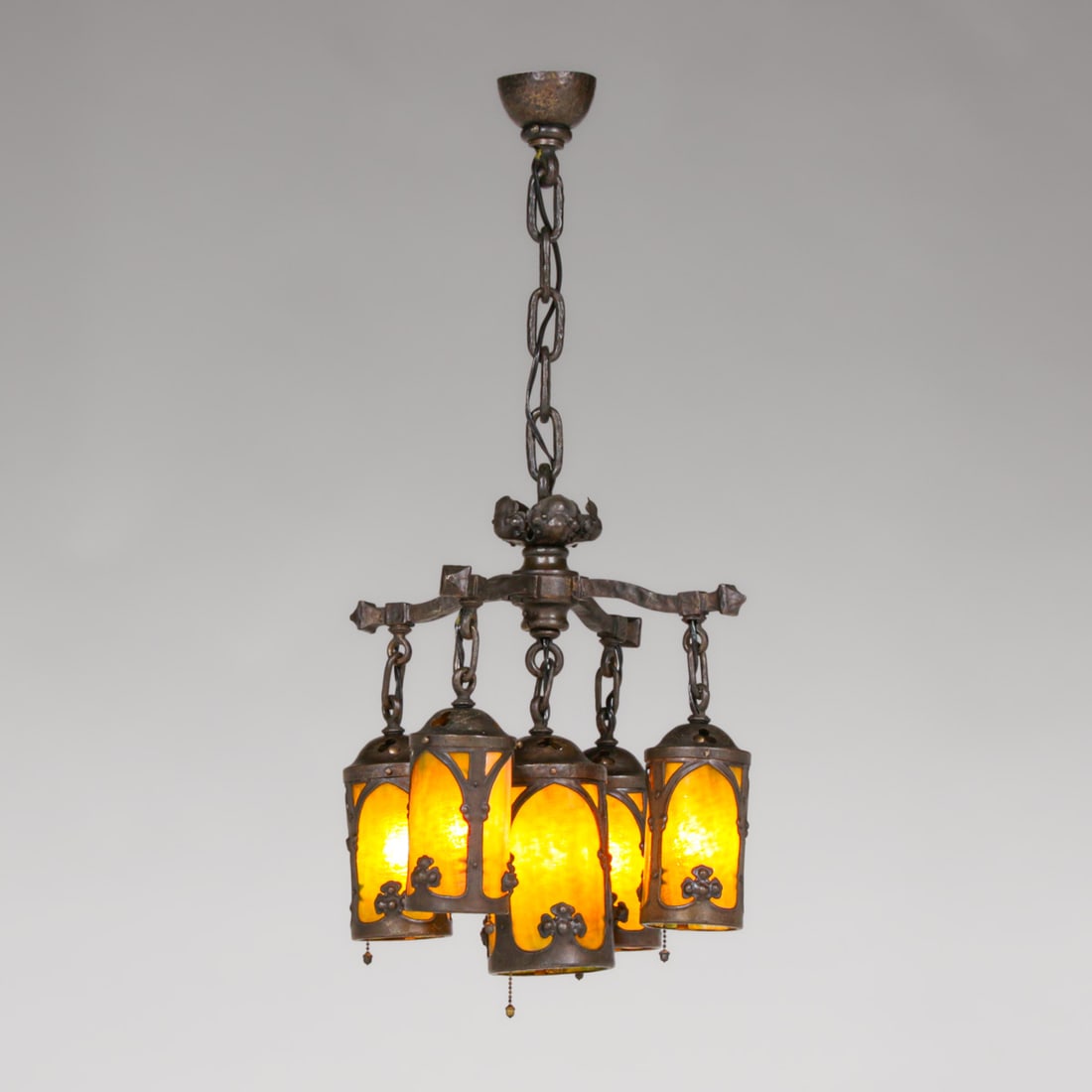 Arts & Crafts Period Cast Iron & Curved Amber Glass Five-Light Chandeliere c1910: Arts & Crafts Period Cast Iron & Curved Amber Glass Five-Light Chandeliere c1910. Unsigned. Excellent original patina. 33"h overall x 16"d. Ceiling cap 3.5"d FREE NATIONWIDE SHIPPING Free Nationwide