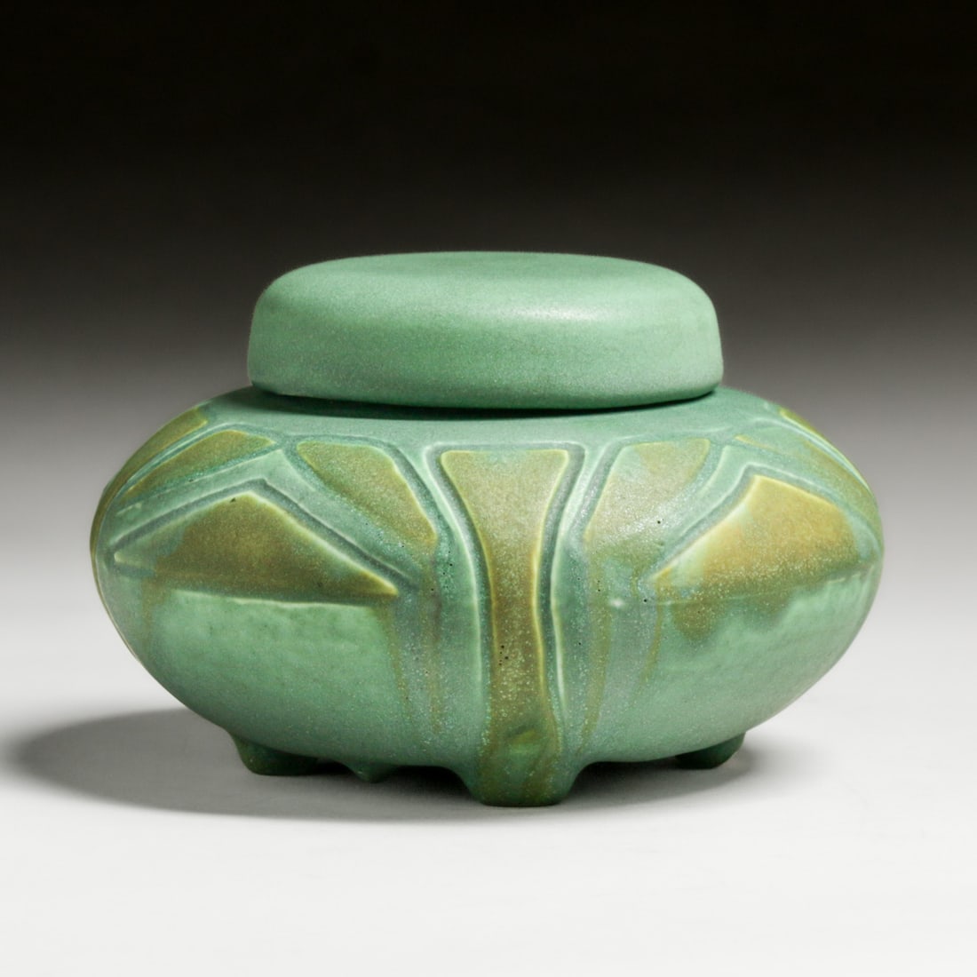 Rookwood Pottery Hand-Carved Covered Matte Green Covered Vase c1910: Rookwood Pottery Hand-Carved Covered Matte Green Covered Vase c1910. Most likely carved by Cecil A. Duell but the glaze covers up all of the markings except the "V" for vellum. Excess grinding to one