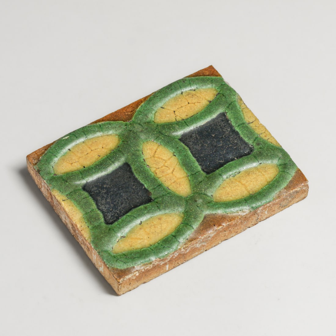 Grueby Four-Color Geometric Tile c1905: Grueby Four-Color Geometric Tile c1905. Signed. Some minor edge chipping on one side. Excellent condition. 6"w x 4 5/8" FREE NATIONWIDE SHIPPING Free Nationwide Shipping within the lower 48 states f