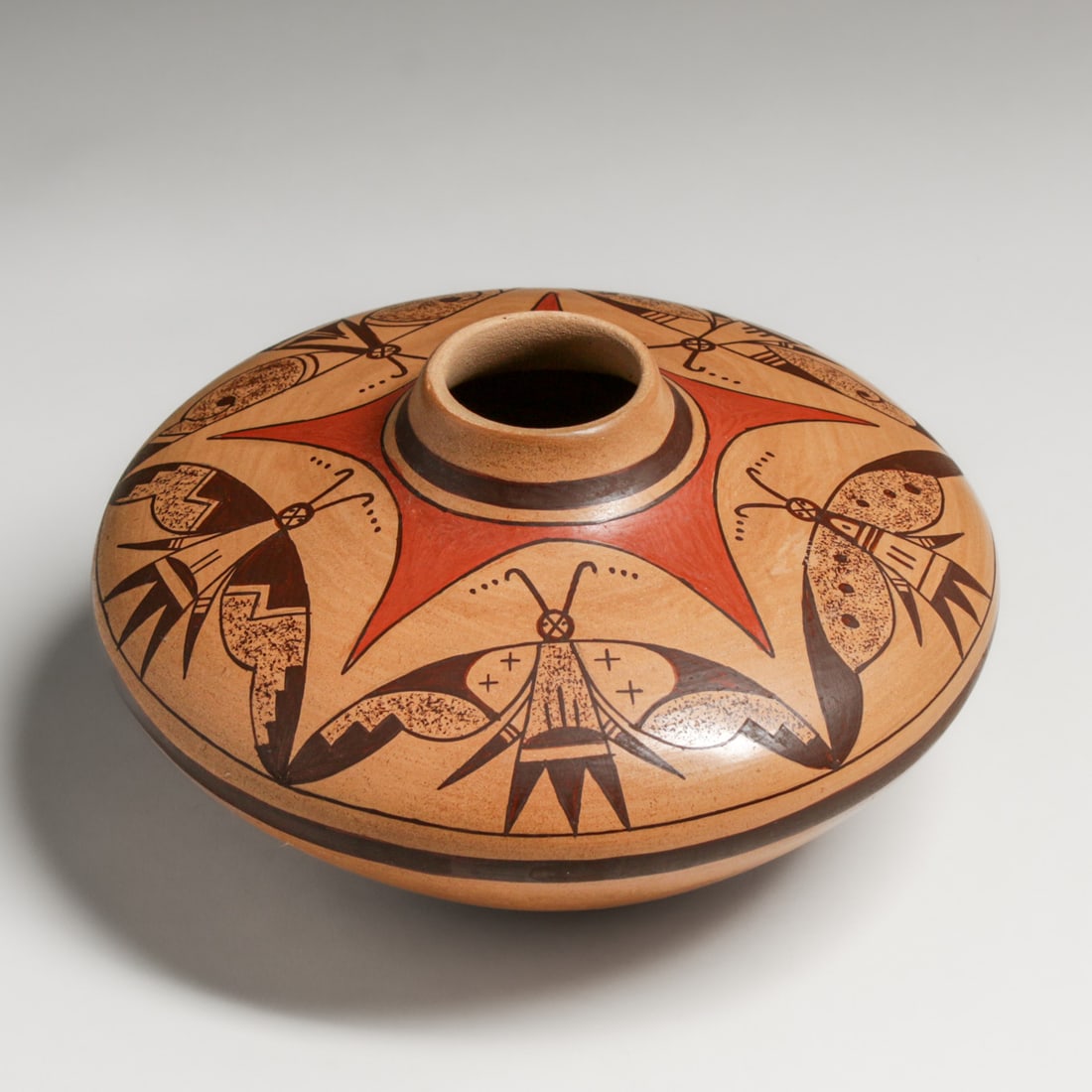 Carla Nampeyo (Born 1961) Hopi-Tewa Pottery Jar c1990: Carla Nampeyo (Born 1961) Hopi-Tewa Pottery Jar c1990. Decorated with traditional red and black butterfly and moth motifs characteristic of the Sikyatki Revival style. Signed. Excellent condition. 8.2