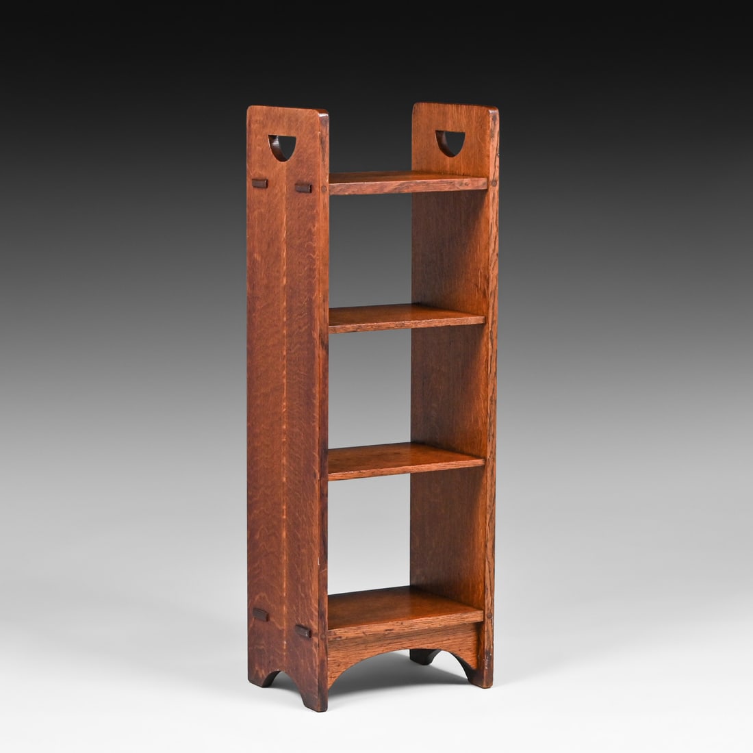 Gustav Stickley D-Handle Cutout Magazine Stand c1910: Gustav Stickley D-Handle Cutout Magazine Stand c1910. Signed with partial paper label. Excellent original finish. Very sturdy. 40"h x 14"w x 10"d FREE NATIONWIDE SHIPPING Free Nationwide Shipping with