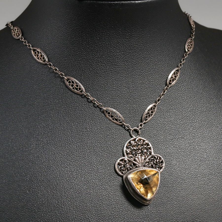 Arts & Crafts Period Sterling Silver Faceted Topaz Pendant Necklace c1910s: Arts & Crafts Period Sterling Silver Faceted Topaz Pendant Necklace c1910s. Unsigned. 14" length + 1.25" drop FREE NATIONWIDE SHIPPINGFree Nationwide Shipping within the lower 48 states for all