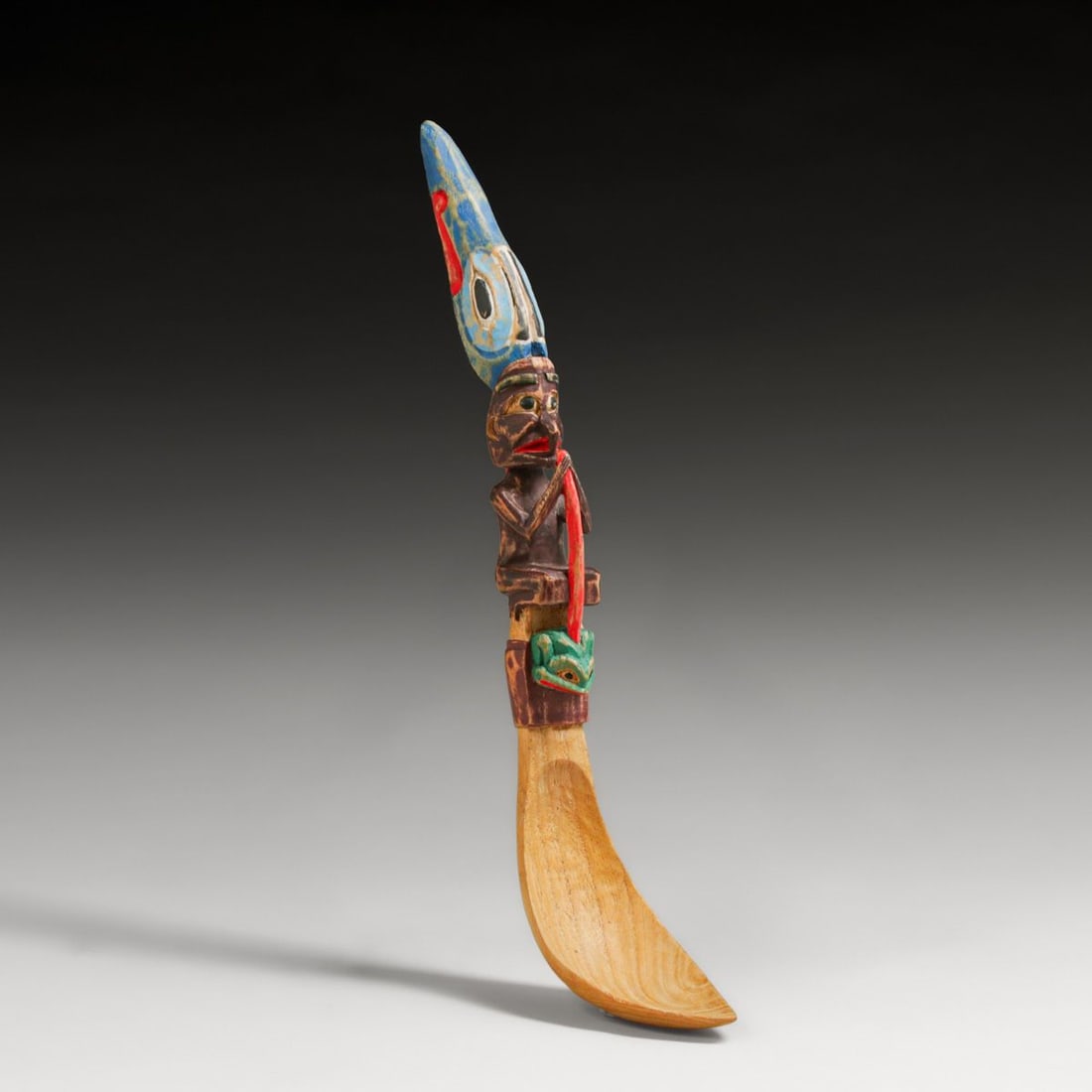 Northwest Coast Native American Carved Ceremonial Spoon: Northwest Coast Native American Carved Ceremonial Spoon. Appears to be 50 to 75 years old. Unsigned. Several small edge chips along edge of spoon. Overall excellent condition. 16" x 2 3/8"w FREE