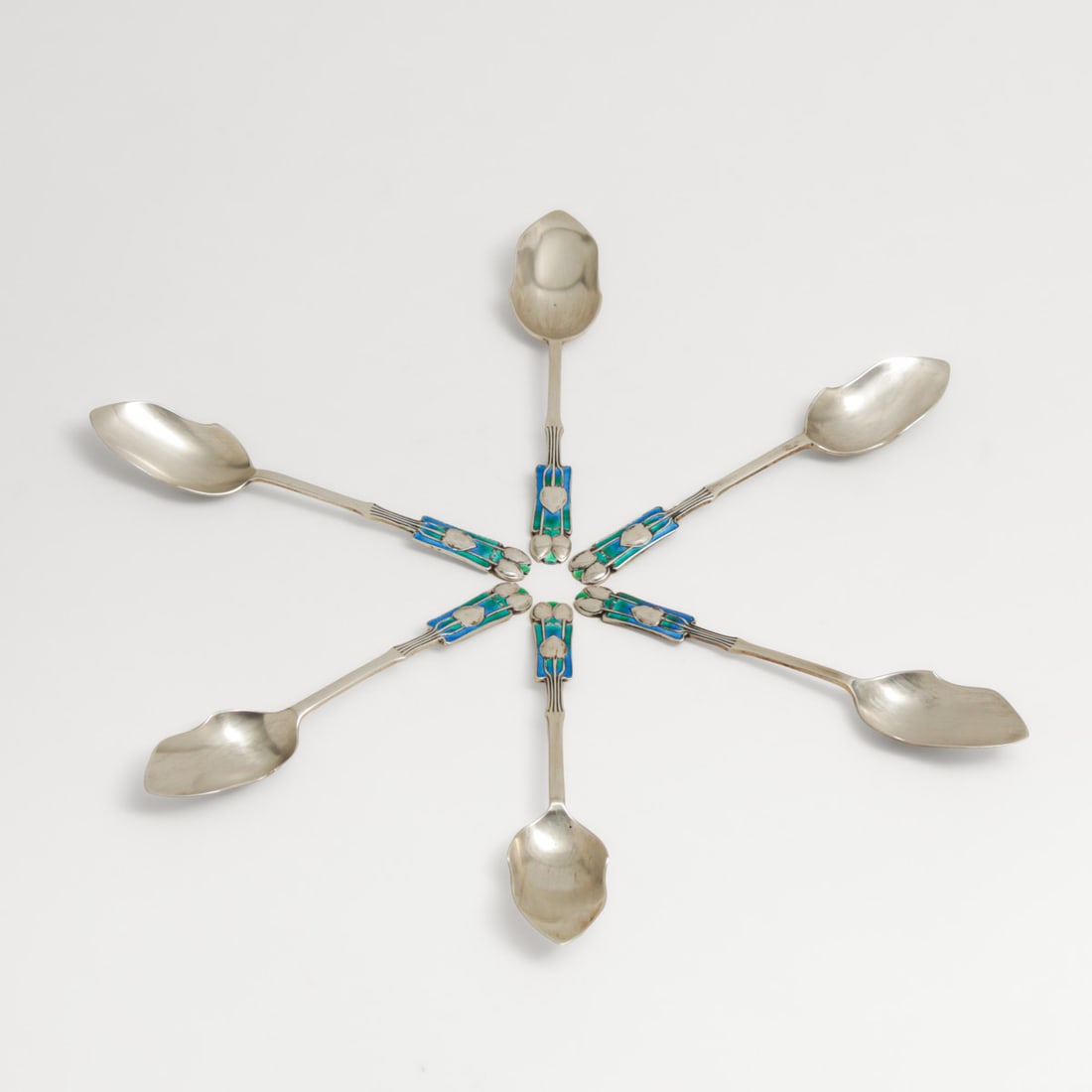 Liberty & Co Archibald Knox Designed Sterling Silver & Enamel Spoons c1900: Liberty & Co Archibald Knox Designed Sterling Silver & Enamel Spoons c1900. Signed. Comes with original box. Spoons in excellent condition. Spoons each measure 5" x 1"w. Box 7.5"w x 5.75" x 1" FREE