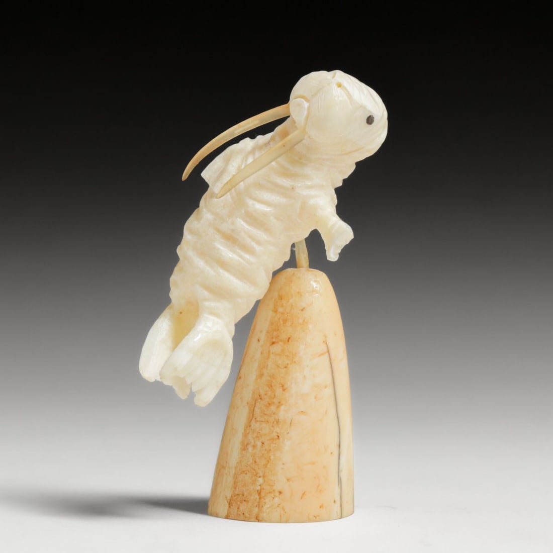 Dennis Pungowiyi (Born 1973) Native Alaskan Yup'ik Hand-Carved Walrus: Dennis Pungowiyi (Born 1973) Native Alaskan Yup'ik Hand-Carved Walrus. Signed "D.H.P." Excellent condition. 3.5"h x 2"w x 1.5"w FREE NATIONWIDE SHIPPINGFree Nationwide Shipping within the lower 48