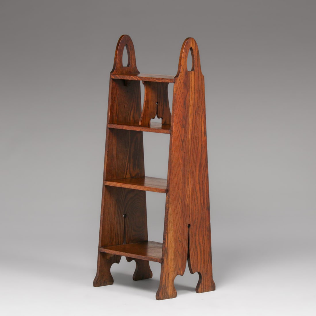 Grand Rapids Cutout Magazine Stand c1910: Grand Rapids Cutout Magazine Stand c1910. Unsigned. Excellent original finish. Very sturdy. 40"h x 18"w x 15"d at base FREE NATIONWIDE SHIPPINGFree Nationwide Shipping within the lower 48 states for