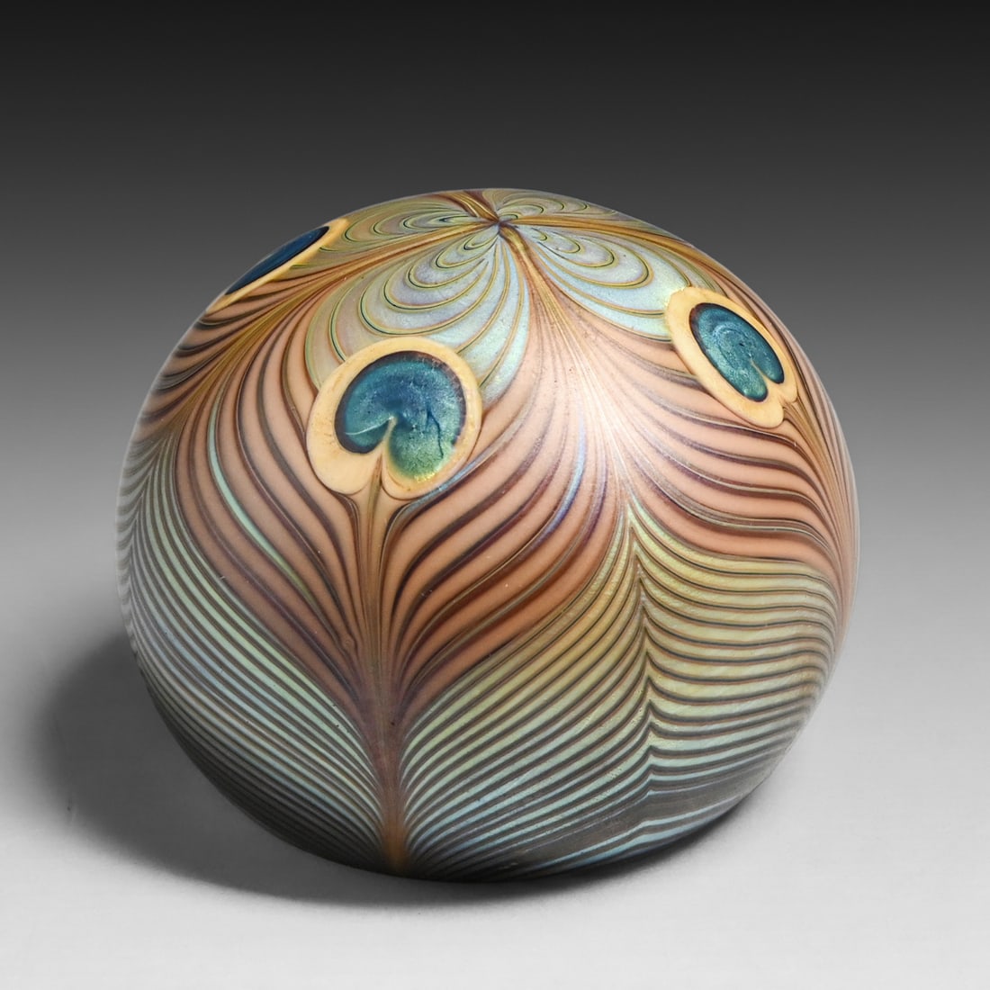 Orient & Flume Art Glass Peacock Feather Paperweight 1976: Orient & Flume Art Glass Peacock Feather Paperweight 1976. Signed. Perfect condition. .75"d x 2.25"h FREE NATIONWIDE SHIPPINGFree Nationwide Shipping within the lower 48 states for all purchases