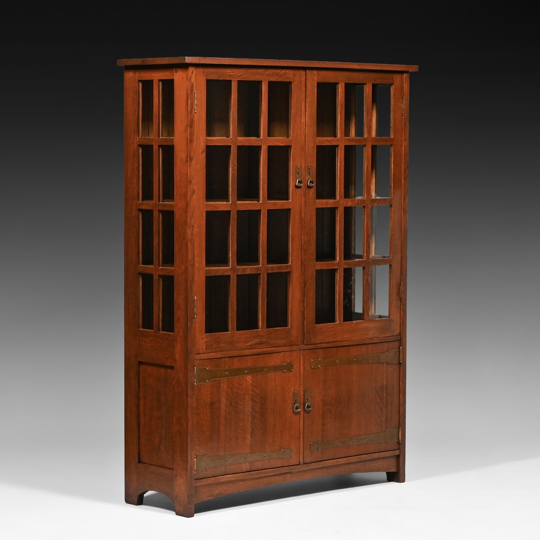 L&JG Stickley Strap-Hinge China Cabinet c1905-1907: L&JG Stickley Strap-Hinge China Cabinet c1905-1907. Signed "L&JG Stickley Handcraft". Color added to original finish. 70"h x 50"w x 17"d FREE NATIONWIDE SHIPPINGFree Nationwide Shipping within the