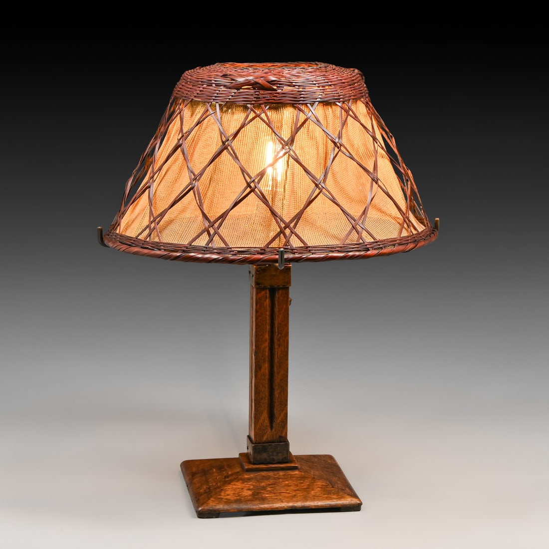Gustav Stickley Oak & Japanese Wicker Lamp c1910: Gustav Stickley Oak & Japanese Wicker Lamp c1910. Signed. Excellent original finish and condition. 18.75”h x 14.25”d FREE NATIONWIDE SHIPPINGFree Nationwide Shipping within the lower 48