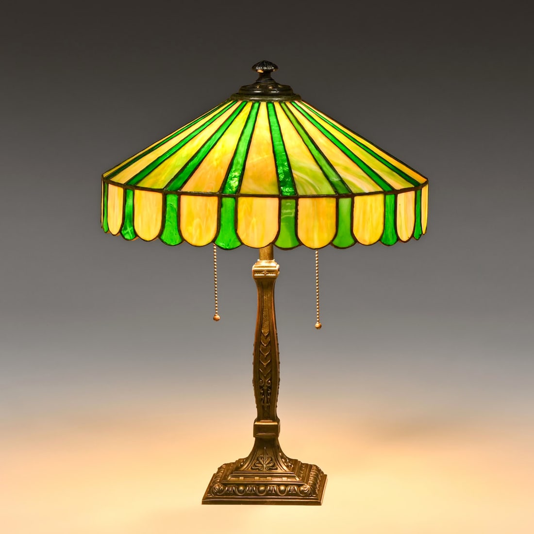Wilkinson Green Geometric Leaded Glass Lamp c1910: Wilkinson Green Geometric Leaded Glass Lamp c1910. Unsigned. Excellent original patina. A few tight line to original leaded glass shade. Overall excellent condition. 22.5"h x 17"d FREE NATIONWIDE