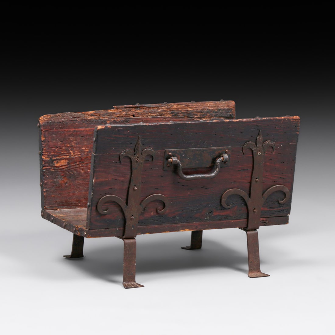 Arts & Crafts - Spanish Revival Wrought Iron & Pine Firewood Log Holder c1920s: Arts & Crafts - Spanish Revival Wrought Iron & Pine Firewood Log Holder c1920s. The distressed nature of this piece makes it looks like an 18th Century piece, but it was likely made in the 1920s and