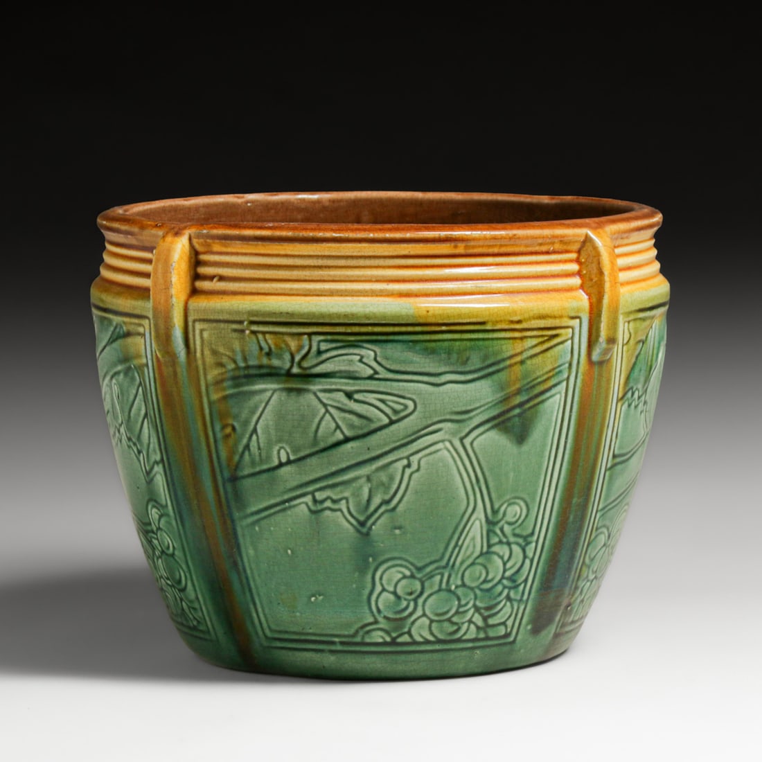 Weller Pottery Majolica Jardiniere c1915: Weller Pottery Majolica Jardiniere c1915. Signed. Very minor edge rubs and glazed over firing line across one handle. 8"h x 10"d FREE NATIONWIDE SHIPPING Free Nationwide Shipping within the lower 48 s