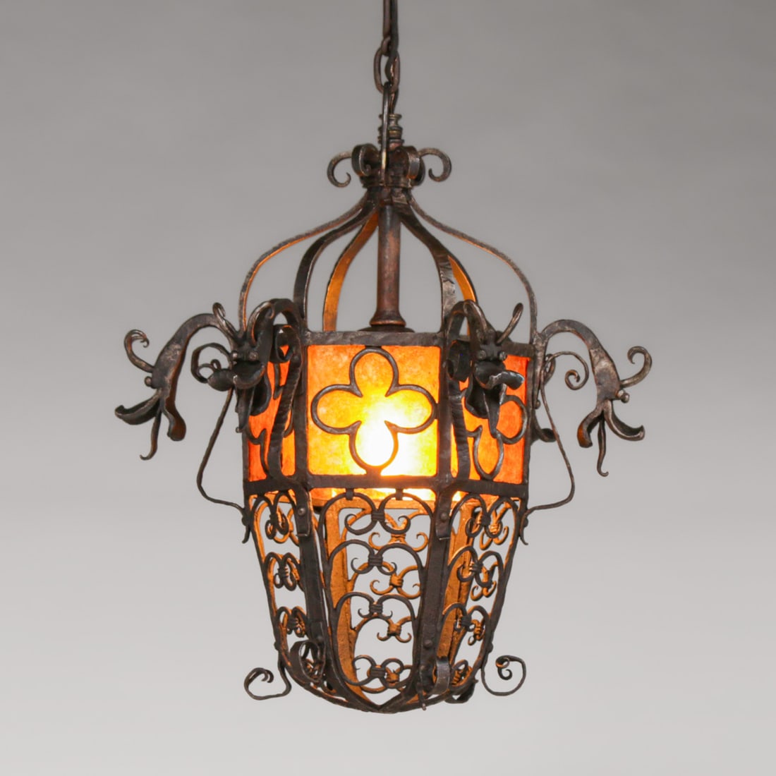 Eric Clausen (Born 1952) Berkeley, CA Hand-Forged Iron & Mica Gothic Dragon Hanging Light c1980s: Eric Clausen (Born 1952) Berkeley, CA Hand-Forged Iron & Mica Gothic Dragon Hanging Light c1980s. Clausen began his artistic journey as a street artist in Berkeley at age 18, teaching himself