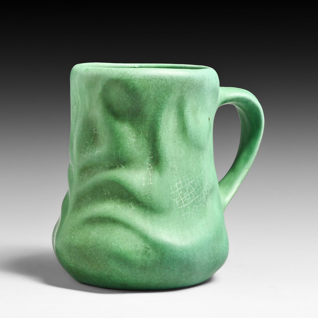 Owens #1108 Matte Green Mug c1910: Owens #1108 Matte Green Mug c1910. Signed. Hevaily crazed and stilt pulls, otherwise perfect condition. 5"h x 5.75"w FREE NATIONWIDE SHIPPINGFree Nationwide Shipping within the lower 48 states for
