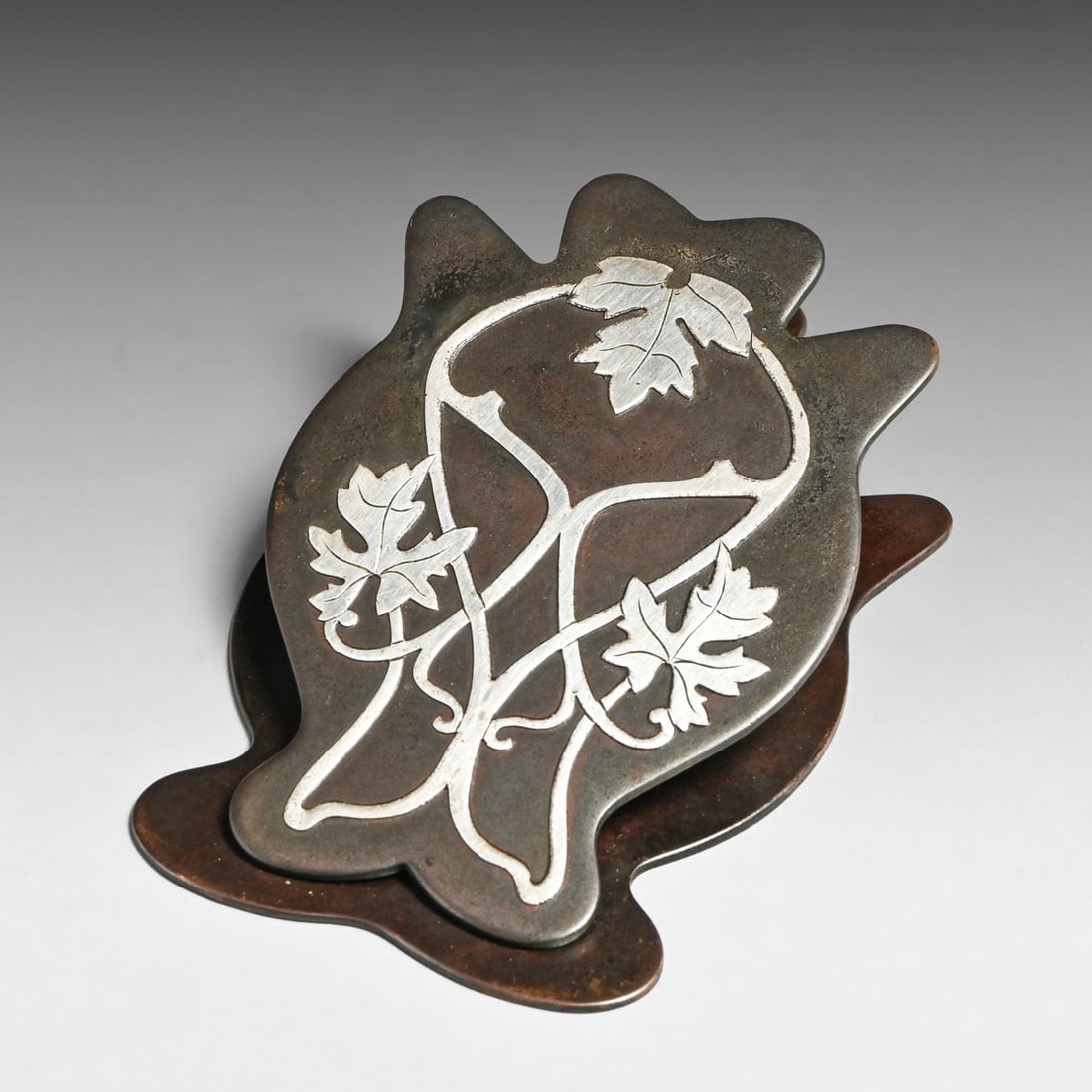 Early Heintz Sterling on Bronze Paper Clip c1910: Early Heintz Sterling on Bronze Paper Clip c1910. Unsigned. Original patina. 3"w x 5" x 1.25"h FREE NATIONWIDE SHIPPINGFree Nationwide Shipping within the lower 48 states for all purchases at our