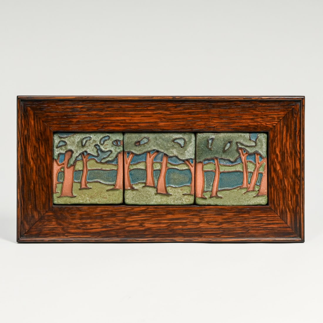 Motawi Tile - Ann Arbor, MI "The Pines" Tile Series c2000s: Motawi Tile - Ann Arbor, MI "The Pines" Tile Series c2000s. Signed. Perfect condition. Tiles each 4" x 4". Oak frame 8"h x 15.75"w FREE NATIONWIDE SHIPPINGFree Nationwide Shipping within the lower